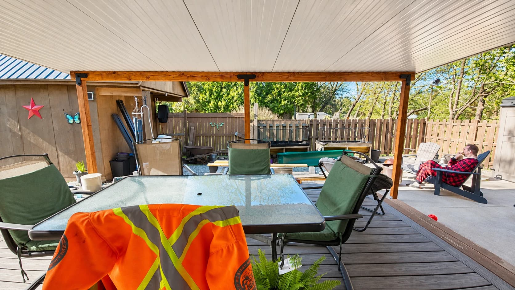 Covered outdoor structure with an insulated roof