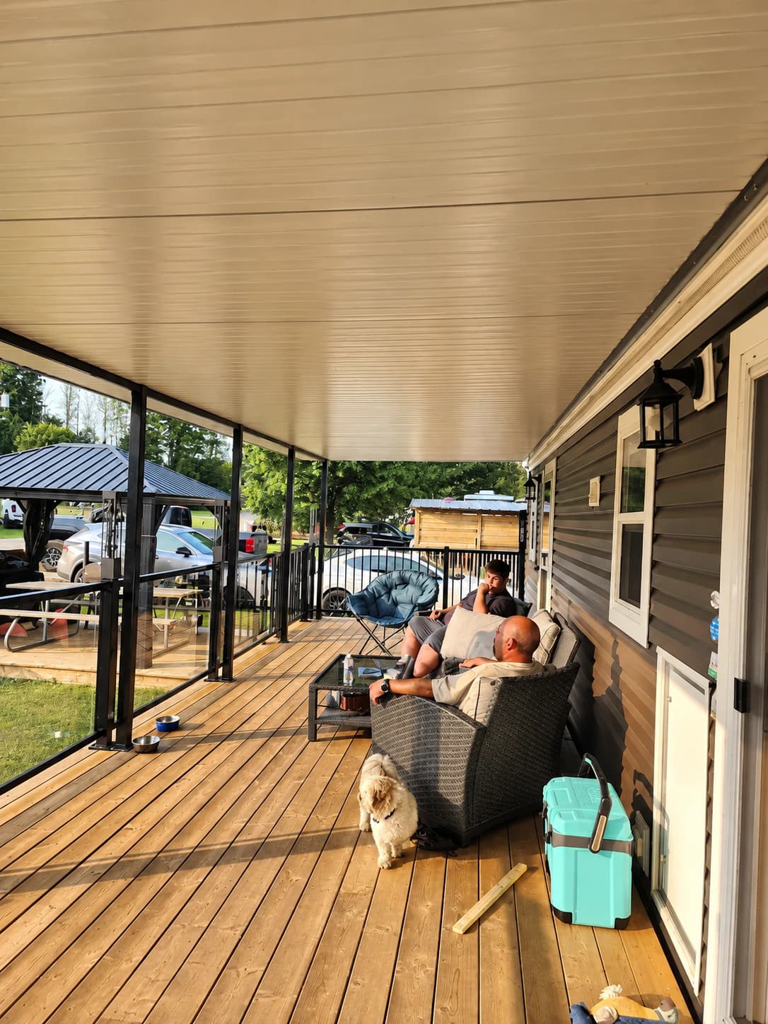 Covered outdoor structure with an insulated roof