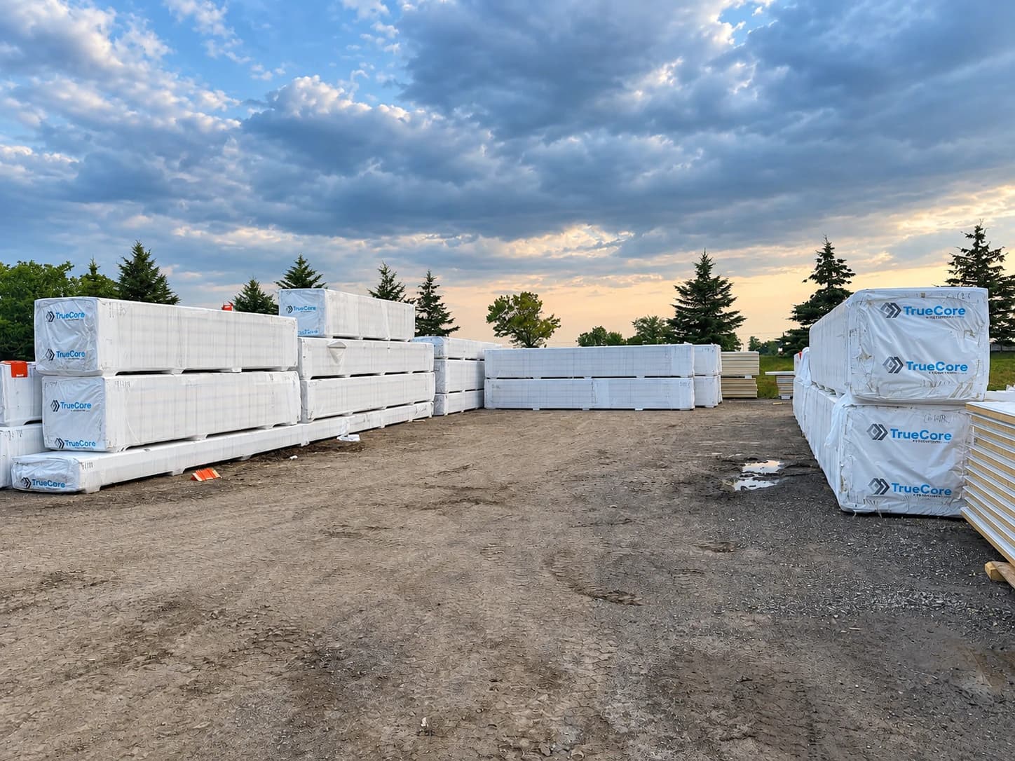 Insulated panels staged in a supply yard or prepared for transport